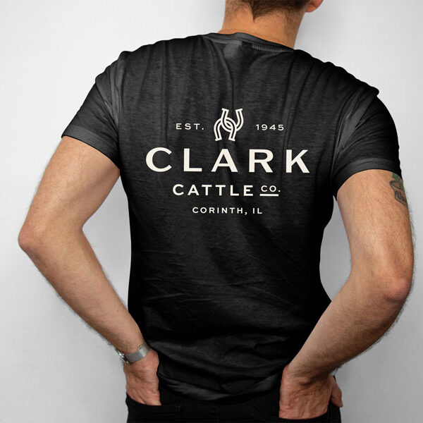 black t shirt with whit clark cattle logo