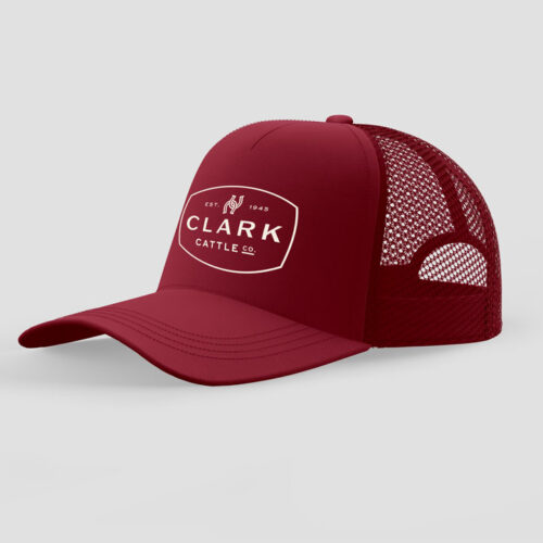 Crimson red trucker hat with Clark Cattle Co. logo